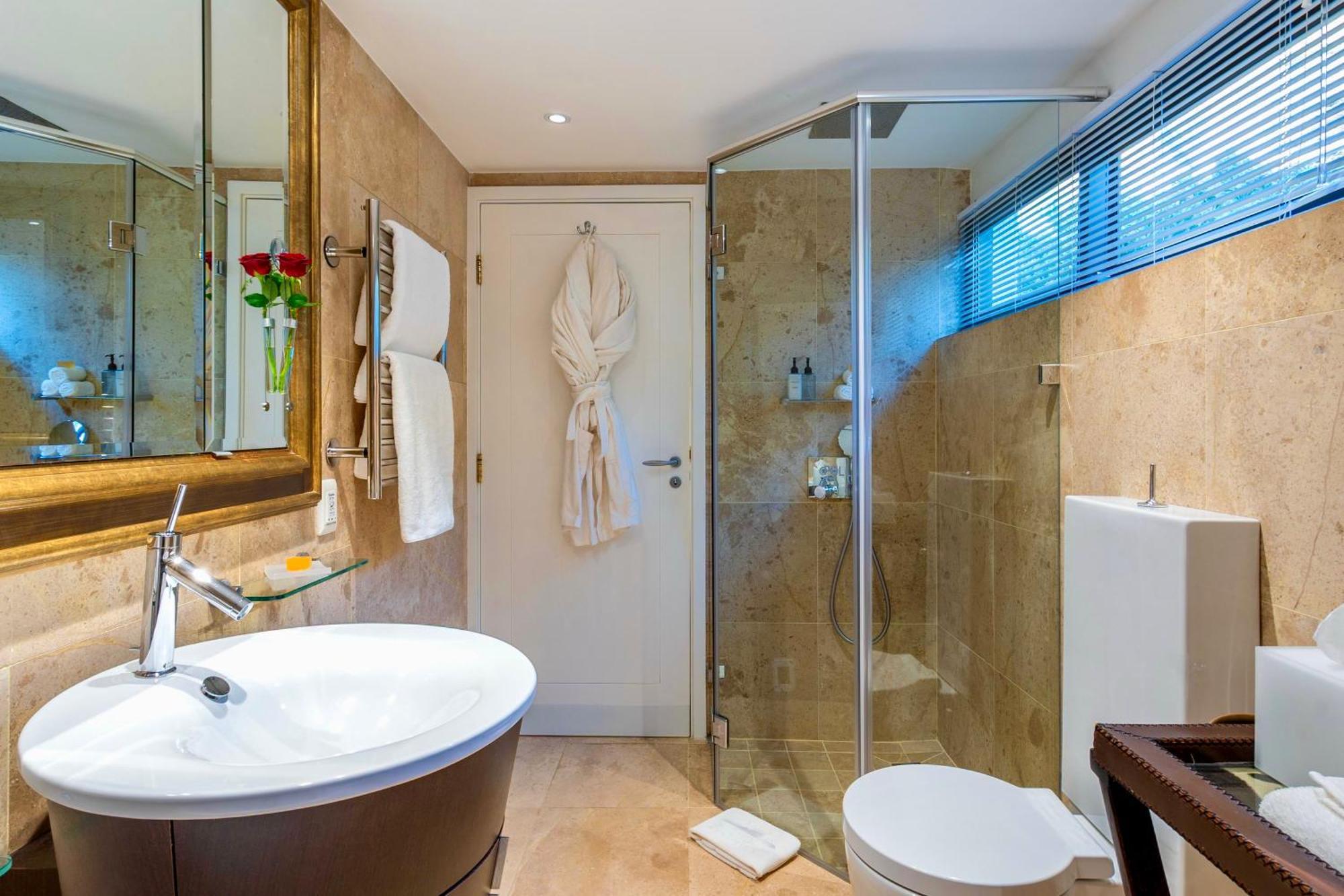 Deluxe Junior Suite with Terrace, Sea View and Mountain View (Master Bedroom)